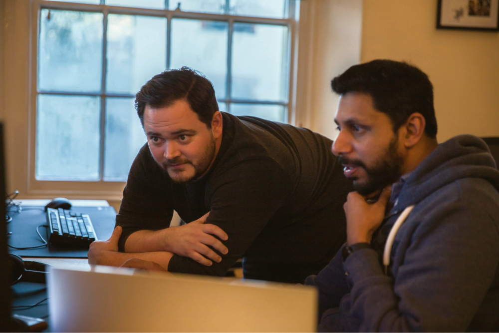 Craig and Tom doing website development