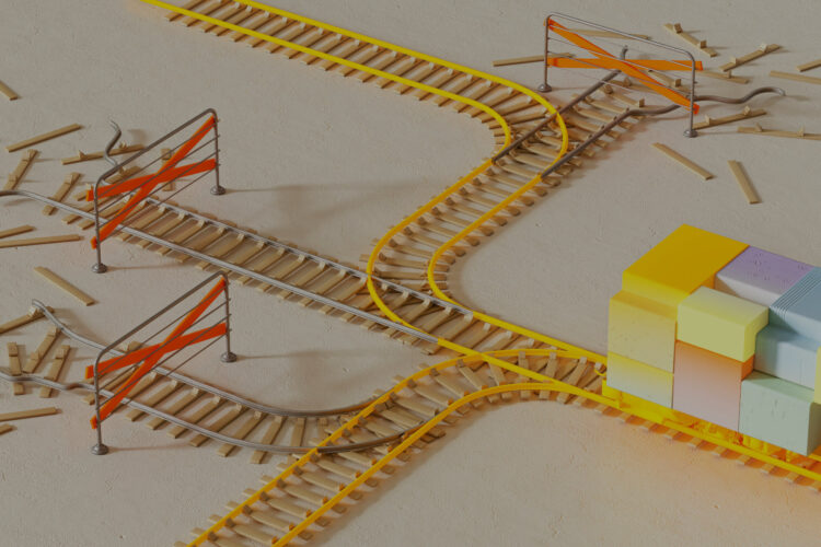 A post-it note train on tracks that go in two directions, with three more possible routes blocked by red gates